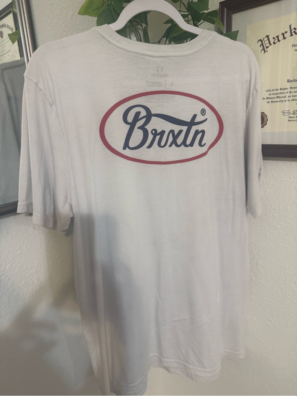 Brixton White Tee with Navy Script and Red Oval